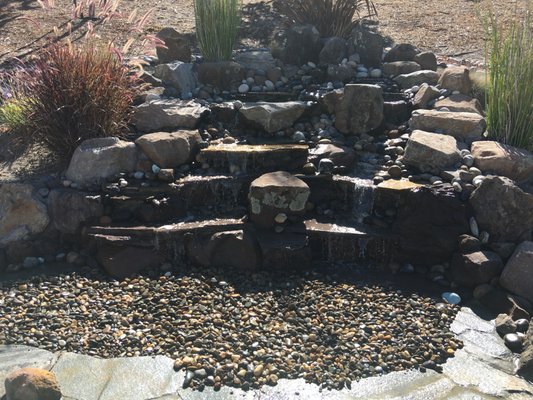 Pondless Waterfalls - We turned this water feature to extremely low maintenance, energy efficient, and attract a variety of wildlife.
Without the algae, mosquitoes, safe for families with young children or pets that love to play in water. Pondless Waterfalls - We turned this water feature to extremely low maintenance, energy efficient, and attract a variety of wildlife.
Without the algae, mosquitoes, safe for families with young children or pets that love to play in water.