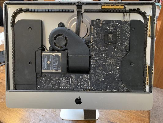 21.5" iMac solid state drive installed and data transferred. - This iMac came with a spinning platter drive, which slowed down dramatically with contemporary operating system installed. Replacing it with a SSD made it faster than new! 21.5" iMac solid state drive installed and data transferred. - This iMac came with a spinning platter drive, which slowed down dramatically with contemporary operating system installed. Replacing it with a SSD made it faster than new!