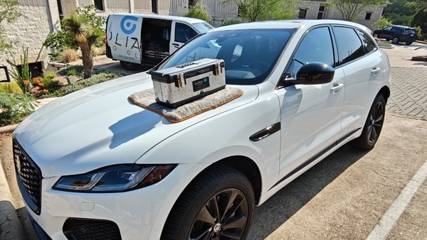 Windshield Repair 2025 Jaguar F-Pace - The subject vehicle, a 2025 Jaguar F-Pace, sustained an exterior impact localized at the lower center section of the windshield. Upon inspection, the primary exterior lite exhibited limited intrusion with no significant propagation into the interior ply. Based on the damage profile and depth, the windshield was determined to be a strong candidate for precision repair rather than full replacement.

The customer advised that the vehicle had been in her possession for only eight days since purchase. Given the replacement cost exceeding $2,500 for OEM glass, a non-invasive repair option was strongly recommended.

The repair process involved the controlled injection of a low-viscosity, high–tensile strength resin utilizing multiple vacuum and pressure cycles to ensure optimal penetration into microfractures. Following resin distribution, carefully modulated heat application was employed to maximize curing, clarity, and bond integrity.

The procedure successfully restored structural stability and optical quality to the affected area, eliminating the need for full glass replacement. The customer expressed a high level of satisfaction with both the outcome and the preservation of her vehicle’s factory-installed windshield.