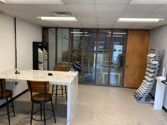 Custom Stone Edge Service Showroom - For our showroom we wanted to have something unique, so went from an old wooden desk to really nice dekton, we also repainted the walls and got some new chairs. We still have more upgrades to do to our showroom but right now we started it off good. Any suggestions on our showroom?