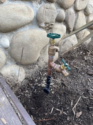 New Hose Garden Bibb - Customer wanted a new garden hose bibb at a new location. There was already an existing garden bibb at another location on far side of the back yard. After digging up the new location and finding an existing sprinkler system, good chance one of the PVC pipes located was one I could use. I cut and tested each pipe to see which is already energized for the other existing hose bibb. After cutting almost all of them, the energized pipe was located. All the piping had to be connected again and some rerouted to make to install the hose bibb connection.
I always drive a metal stake to strap the pipe to and pour concrete around the pipe to stabilize it during use. This hose bibb will give them years of use. I also install them in a way the customer can change the hose bibb easily if it fails. New Hose Garden Bibb - Customer wanted a new garden hose bibb at a new location. There was already an existing garden bibb at another location on far side of the back yard. After digging up the new location and finding an existing sprinkler system, good chance one of the PVC pipes located was one I could use. I cut and tested each pipe to see which is already energized for the other existing hose bibb. After cutting almost all of them, the energized pipe was located. All the piping had to be connected again and some rerouted to make to install the hose bibb connection.
I always drive a metal stake to strap the pipe to and pour concrete around the pipe to stabilize it during use. This hose bibb will give them years of use. I also install them in a way the customer can change the hose bibb easily if it fails.