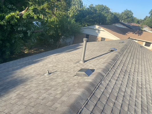 OKC Roof replacement after a big storm causing trees to fall on the roof - This customer located in OKC, was shocked when his tree limbs had fallen on his home causing a leak! We answered the call and the very next day cleared the limbs and tarped his roof, worked directly with the customers insurance company and was able to get the entire job approved and cleared the limbs and installed a beautiful new roof thats guaranteed to never leak.  Call 405-241-2455 today so you can prevent any pesky water leaks in your home!