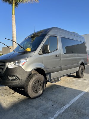 Sprinter Van Customization with Mil-Spec - Customer dropped off Sprinter for some custom Milspec Liner spray. Color matched Milspec liner for the rocker panels. Plastic moldings sprayed in our MilSpec Liner with UV Coating.