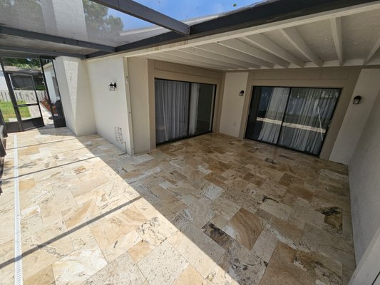 Travertine Transformation - A patio transformation that needs to be seen to be believed! With the original red tile lifting up off the surface and an in-ground hot tub that had long been out of commission, this Oldsmar home was in desperate need of a makeover. Though we ran into some interesting obstacles during demolition, our resourcefulness won in the end, leaving the customer with a stunning result. The change from old, red tile to the fresh and bright travertine is truly like night and day.
Material: Stonemart Leonyx travertine pavers, French pattern Travertine Transformation - A patio transformation that needs to be seen to be believed! With the original red tile lifting up off the surface and an in-ground hot tub that had long been out of commission, this Oldsmar home was in desperate need of a makeover. Though we ran into some interesting obstacles during demolition, our resourcefulness won in the end, leaving the customer with a stunning result. The change from old, red tile to the fresh and bright travertine is truly like night and day.
Material: Stonemart Leonyx travertine pavers, French pattern