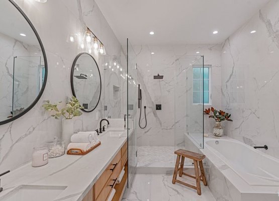 Bathroom Remodel - These are all shots of the bathrooms at one of our projects following the same color/aesthetic design. 
We do complete installation - all new plumbing, tiles, plumbing fixtures, glass doors, tub, countertops and cabinets, etc.