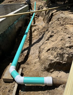 Typical Rough In Drain - Rough in of the drainage system, foundation penetration and transition into the structure, and interior drainage rough-in with proper venting and trap configuration. Straight trenches with consistent grading. No unnecessary stress on fittings. Proper long-sweep fittings instead of hard 90s. Proper P-trap orientation. Typical Rough In Drain - Rough in of the drainage system, foundation penetration and transition into the structure, and interior drainage rough-in with proper venting and trap configuration. Straight trenches with consistent grading. No unnecessary stress on fittings. Proper long-sweep fittings instead of hard 90s. Proper P-trap orientation.