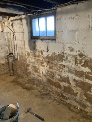 Basement Corner Wall Waterproofing - This corner of a basement wall was crumbling away. Every time a rainstorm would come, water would pour into the basement though this wall. We fixed this problem at a third of the cost of installing an interior drainage system! Basement Corner Wall Waterproofing - This corner of a basement wall was crumbling away. Every time a rainstorm would come, water would pour into the basement though this wall. We fixed this problem at a third of the cost of installing an interior drainage system!