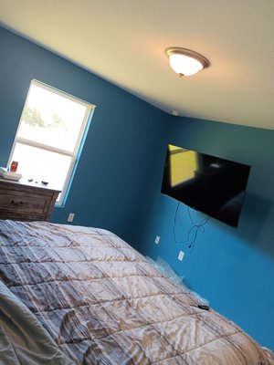 Repaint a bedroom - This customer bought a newly built home but every room was WHITE. so he chose the color he wanted and we got started. Another happy customer.