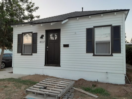 Exterior Paint Project. - This was an exterior paint project on a house that was in pretty rough shape. Our clients had just got married and purchased this house, and we were excited to help them transform the exterior of their house! We took care of all of the siding & trim repairs, and when we were finished they could not have been happier with their newly repaired & painted home.