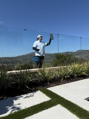 Glass Wall Cleaning! - We clean this glass wall quarterly to ensure that it’s always looking its best! The key with cleaning these walls is frequently cleaning them to ensure they don’t get too much baked on dirt that can lead to water spots etc. Our Spotless water-fed pole system removes the dirt and leaves leaving a spotless streak free finish!