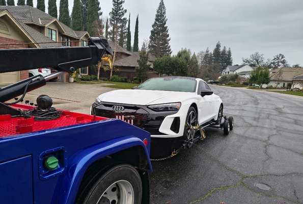 Wheel lift Towing Service - The Challenge:
The customer’s vehicle suffered a complete electrical failure, leaving the transmission permanently locked in Park. For high-end All-Wheel Drive (AWD) vehicles, dragging the car onto a tow truck while in gear can cause thousands of dollars in transmission damage.
Our Professional Solution:
To ensure a 100% damage-free tow, we utilized a precision wheel lift paired with high-speed dollies. By loading the wheels into the dolly frames, we lifted the entire vehicle off the pavement. This "zero-roll" method allows us to transport the vehicle safely without the wheels ever needing to turn. Wheel lift Towing Service - The Challenge:
The customer’s vehicle suffered a complete electrical failure, leaving the transmission permanently locked in Park. For high-end All-Wheel Drive (AWD) vehicles, dragging the car onto a tow truck while in gear can cause thousands of dollars in transmission damage.
Our Professional Solution:
To ensure a 100% damage-free tow, we utilized a precision wheel lift paired with high-speed dollies. By loading the wheels into the dolly frames, we lifted the entire vehicle off the pavement. This "zero-roll" method allows us to transport the vehicle safely without the wheels ever needing to turn.