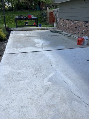 Resurfaced concrete patio. - This concrete patio was old had layers of paint, cracks and pitting. The surface was very rough making it unpleasant to walk on with bare feet. We had to grind the cement clean, fix cracks and patch a lot of bad areas. We also added a concrete platform that was needed for some new steps that came down from a new deck. After we finished resurfacing the concrete patio with the new section, it all came together and looked like one. Resurfaced concrete patio. - This concrete patio was old had layers of paint, cracks and pitting. The surface was very rough making it unpleasant to walk on with bare feet. We had to grind the cement clean, fix cracks and patch a lot of bad areas. We also added a concrete platform that was needed for some new steps that came down from a new deck. After we finished resurfacing the concrete patio with the new section, it all came together and looked like one.