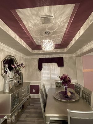 Dining Room staging - A dining room redecorated using a spectrum of purples.