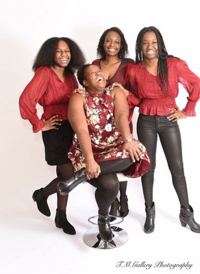 Family Portraits - Book your family photos today!
Whatever your special moment may be, our mission is to capture it artistically while providing you with the best experience. We have alot of beautiful backdrops to enhance any family photos. 

Bring your family in today while TM Gallery is offering a New Years special.