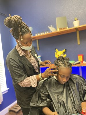 Child's Loc Maintenance and Taper Cut - Loc Maintenance and Taper Cut. Child's Loc Maintenance and Taper Cut - Loc Maintenance and Taper Cut.