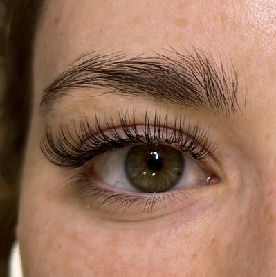 Classic Lashes - Elevate your daily routine with a set of Classic Lashes at Anahi Beauty. Our classic sets provide a 1:1 application for a natural, 'mascara-only' look that adds length and perfect curl without the weight. We prioritize lash health by using premium, lightweight extensions tailored to your eye shape.