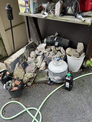 Backyard clean out of rocks and heavy oil drum. - This homeowner needed rocks and a very heavy oil drum filled with dirt to be removed from there backyard. The Junk Assassins Team was happy to answer the call! Backyard clean out of rocks and heavy oil drum. - This homeowner needed rocks and a very heavy oil drum filled with dirt to be removed from there backyard. The Junk Assassins Team was happy to answer the call!