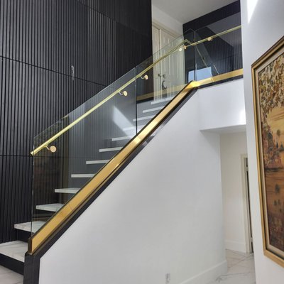 Custom Glass Railings - At CDO Glass, we design and install premium custom glass railings that combine safety, sophistication, and modern style. Whether for residential homes or commercial spaces, our glass railing systems are built to enhance open views, maximize natural light, and create a sleek architectural look.