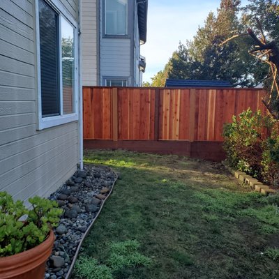 Picture Frame Fences in Aptos - Do you have a fence that shares a boundary line with a neighbor? If so, then you may know that it can be difficult to get your fence replaced. No one wants to be stuck with the backside of a fence facing their yard, especially if they’re paying for a portion. However, a “good neighbor fence” can help homeowners on both sides be satisfied with what they see from their yards. There’s no need to have an eyesore on one side of the fence. Typically, normal fences will have the presentable side with boards facing outwards, with the posts and stringers facing in towards the yard. But, a good neighbor fence is built differently and looks identical on both sides. This is especially important when it comes to a shared fence on a boundary line with a neighbor. No one needs to compromise and accept that they have the “bad side” if you use this kind of fence. Picture Frame Fences in Aptos - Do you have a fence that shares a boundary line with a neighbor? If so, then you may know that it can be difficult to get your fence replaced. No one wants to be stuck with the backside of a fence facing their yard, especially if they’re paying for a portion. However, a “good neighbor fence” can help homeowners on both sides be satisfied with what they see from their yards. There’s no need to have an eyesore on one side of the fence. Typically, normal fences will have the presentable side with boards facing outwards, with the posts and stringers facing in towards the yard. But, a good neighbor fence is built differently and looks identical on both sides. This is especially important when it comes to a shared fence on a boundary line with a neighbor. No one needs to compromise and accept that they have the “bad side” if you use this kind of fence.