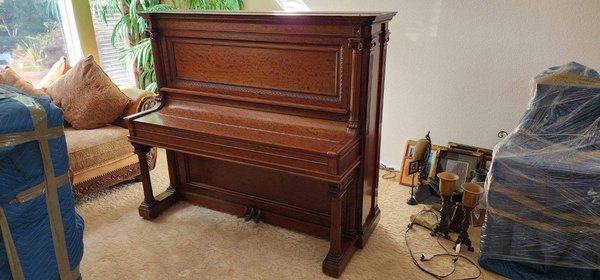 Upright Piano Moving - This was a large upright piano we moved from San Clemente to Temecula. You can see here the care that goes into our work, and how important it is to our team to ensure no damages happen to such a beautiful piece