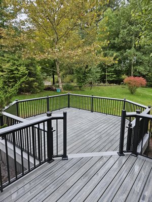 Bi-level Composite Deck - This 700+ sq. ft. deck had seen better days when we began the replacement. The existing deck wasn't that old, just built poorly so the framing lumber was in really good shape. We used waterproof tape to protect the lumber and extend it's life close the the 25+ year lifespan of the composite and vinyl products. This one turned out great and wears the matt black aluminum railings and two-tone Trex decking very well. Another happy customer in Doylestown, PA! Bi-level Composite Deck - This 700+ sq. ft. deck had seen better days when we began the replacement. The existing deck wasn't that old, just built poorly so the framing lumber was in really good shape. We used waterproof tape to protect the lumber and extend it's life close the the 25+ year lifespan of the composite and vinyl products. This one turned out great and wears the matt black aluminum railings and two-tone Trex decking very well. Another happy customer in Doylestown, PA!