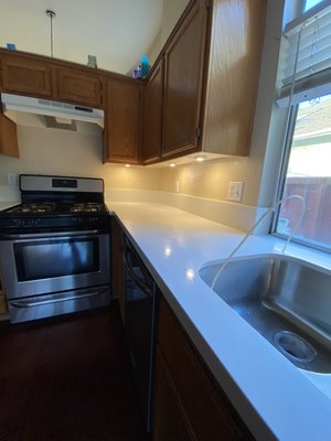 Quick Kitchen Upgrade! - This beautiful Kitchen upgrade was a one day turnaround! Project was demo existing tile countertops and backsplash, replace sink with a new under mount sink, new under-cabinet lighting and touchup repair on some cabient doors! Client was so happy with the one day turn around and loved her new upgrades! Quick Kitchen Upgrade! - This beautiful Kitchen upgrade was a one day turnaround! Project was demo existing tile countertops and backsplash, replace sink with a new under mount sink, new under-cabinet lighting and touchup repair on some cabient doors! Client was so happy with the one day turn around and loved her new upgrades!