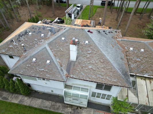 New Roof Installation in Mansfield, MA - E&B Roofing completed a full roof replacement in Mansfield, MA using a new CertainTeed roofing system. The project included removal of the old roof, installation of the new roof system, and new fascia and gutters for a clean, durable finish.