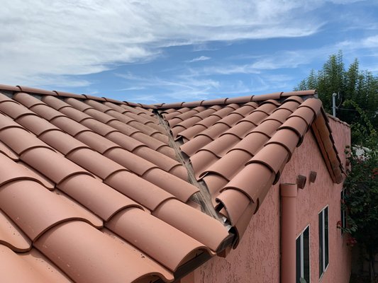Spanish S-Tile Roof - Old tile roof with broken and damaged tiles, new plywood where needed, and new Spanish S-Tile roof