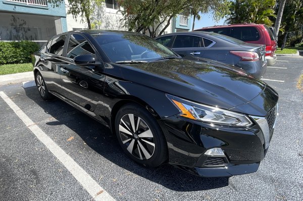2022 Nissan Altima - Applied 15% film all around and added a custom, thick windshield strip on this beautiful brand new 2022 Nissan Altima.

It is not too early to have your windows tinted for the summer. Contact us for a quote today!