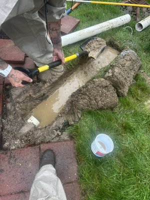 Drainage/downspouts - This is a water issue repair. Buried down spouts, and extended them past paver patio. Tamped and leveled old patio, and replaced blocks. Drainage/downspouts - This is a water issue repair. Buried down spouts, and extended them past paver patio. Tamped and leveled old patio, and replaced blocks.