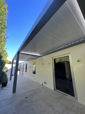 Louvered Patio Cover Dana Point - We recently completed this sleek louvered patio cover in the stunning city of Dana Point! The homeowner wanted a design that was both functional and minimalistic, while seamlessly complementing their home’s aesthetic. We’re happy to say they got exactly what they were looking for and couldn’t be more delighted with the results! Louvered Patio Cover Dana Point - We recently completed this sleek louvered patio cover in the stunning city of Dana Point! The homeowner wanted a design that was both functional and minimalistic, while seamlessly complementing their home’s aesthetic. We’re happy to say they got exactly what they were looking for and couldn’t be more delighted with the results!