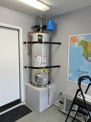 50 gallon water heater install. - Here is a couple different water heater installs that were recently done. One is a 50 gallon the other is a 40gallon. Both are code compliant and very clean.