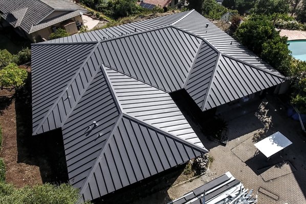 Residential Metal Roof Installation / Rancho Palos Verdes, CA - A Metal Roof Replacement in Palos Verdes, California with a standing seam roofing system colored in slate gray. The standing seam was an inch and a half and we used a poly glass MTS peel and stick underlayment to guarantee the installation and finish.
Video: https://vimeo.com/760727226 Residential Metal Roof Installation / Rancho Palos Verdes, CA - A Metal Roof Replacement in Palos Verdes, California with a standing seam roofing system colored in slate gray. The standing seam was an inch and a half and we used a poly glass MTS peel and stick underlayment to guarantee the installation and finish.
Video: https://vimeo.com/760727226