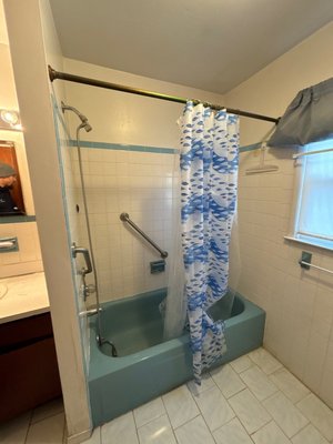 Lawrence Township Tub to Shower Conversion - Converting an old bathtub with outdated tile into a safe, accessible walk-in shower involves removing the tub and tile, repairing the subfloor, and installing a low-threshold or shower pan for easy access. Artic Ice Luxsan walls infused with Microban. Added a bench seat (17-19 inches high) and ADA-compliant grab bars anchored to studs for safety. Install a luxurious rain showerhead and a handheld showerhead on an adjustable slide bar, both with anti-scald valves. The result is a modern, accessible shower with enhanced safety and a spa-like feel. Lawrence Township Tub to Shower Conversion - Converting an old bathtub with outdated tile into a safe, accessible walk-in shower involves removing the tub and tile, repairing the subfloor, and installing a low-threshold or shower pan for easy access. Artic Ice Luxsan walls infused with Microban. Added a bench seat (17-19 inches high) and ADA-compliant grab bars anchored to studs for safety. Install a luxurious rain showerhead and a handheld showerhead on an adjustable slide bar, both with anti-scald valves. The result is a modern, accessible shower with enhanced safety and a spa-like feel.