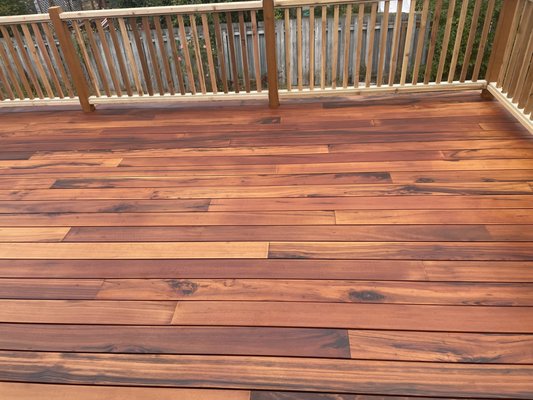 Hardwood Deck Build - This was a custom tigerwood deck solution built on a second story. It features under-deck waterproofing so that the deck can be enjoyed all year round. Hardwood Deck Build - This was a custom tigerwood deck solution built on a second story. It features under-deck waterproofing so that the deck can be enjoyed all year round.