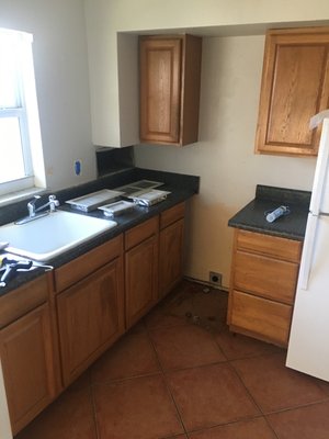 Kitchen cabinets - This client wanted to update the look of the kitchen in this rental without having to replace the cabinets so we fixed him up!