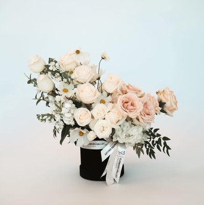 Sympathy and Funeral Flowers - We work with families and funeral homes to create arrangements that feel personal, not generic, standing sprays, casket pieces, and sympathy bouquets delivered on tight timelines when it matters most. Every piece is built around the tone the family wants, whether that's soft and traditional or bright and celebratory of a life well lived.