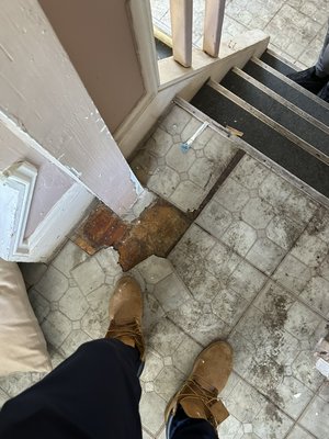 Floor tile repair - Owner wanted the old damaged tile took up and new and improved tile installed. Floor tile repair - Owner wanted the old damaged tile took up and new and improved tile installed.