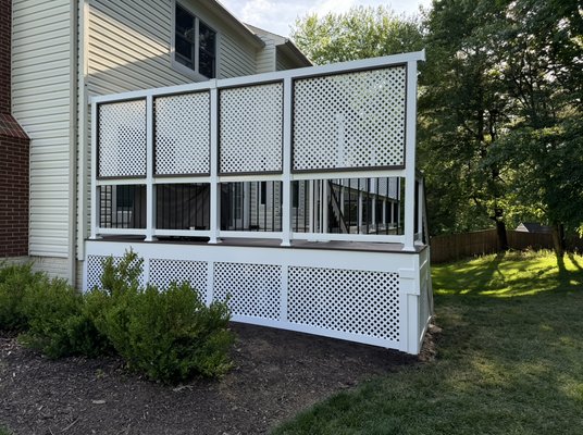 35”x12’ composite deck project in Olney MD - Remove smaller wood deck. Build new 35’ X 12’ composite deck with AZEK composite decking, white vinyl railing and black aluminum baluster and then finished with a deck board as rail cap. Added privacy lattice on sides for a more exclusive finish. Wide stairs to grade with privacy lattice below deck on the side and stair area. Homeowner love their new outdoor living space.
WE CAN DO THE SAME FOR YOU! 35”x12’ composite deck project in Olney MD - Remove smaller wood deck. Build new 35’ X 12’ composite deck with AZEK composite decking, white vinyl railing and black aluminum baluster and then finished with a deck board as rail cap. Added privacy lattice on sides for a more exclusive finish. Wide stairs to grade with privacy lattice below deck on the side and stair area. Homeowner love their new outdoor living space.
WE CAN DO THE SAME FOR YOU!