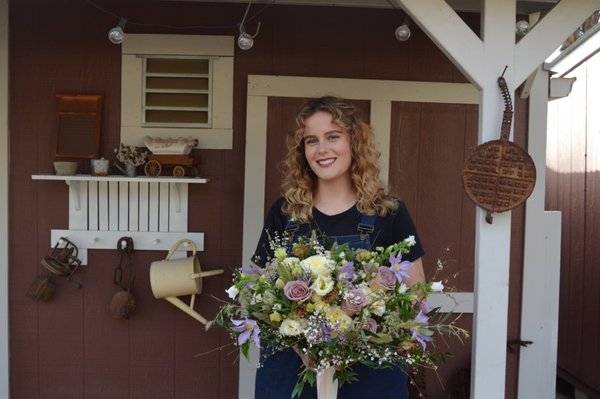 Meet the Owner - Welcome to Prairie Fields Floral Co., where vintage beauty meets modern elegance. We enjoy combining organic texture with lush florals to capture the essence of any occasion. Drawing inspiration from all things vintage, we bring a fresh perspective to floral design, infusing each piece with a touch of old-world charm. Whether you’re planning a wedding, event, or just want to brighten someone’s day, we are committed to making each occasion memorable for years to come.
My name is Andie Piovesan and I am the creative force behind Prairie Fields Floral Co. My passion for floral design started at a young age, creating designs for family and friends. After graduating from the California State University of Long Beach I moved to San Diego County and started my humble beginnings at a successful brick and mortar flower shop in Escondido California that had been a staple in North County San Diego for almost 50 years until they retired. Then moving on to work for one of San Diego's largest floral companies designing high volume weddings and events.
My love and passion for all things vintage inspires my floral design and way of life. From vintage fabrics, architecture, cars, clothing, and everyday items, I love it all. My love for music is also what inspires me, my music taste ranges from 1960's garage rock, to 1950's/ 1960's country music, to 1970's/ 1980's punk rock and lots in-between.
I look forward to meeting you and creating your next celebration! Meet the Owner - Welcome to Prairie Fields Floral Co., where vintage beauty meets modern elegance. We enjoy combining organic texture with lush florals to capture the essence of any occasion. Drawing inspiration from all things vintage, we bring a fresh perspective to floral design, infusing each piece with a touch of old-world charm. Whether you’re planning a wedding, event, or just want to brighten someone’s day, we are committed to making each occasion memorable for years to come.
My name is Andie Piovesan and I am the creative force behind Prairie Fields Floral Co. My passion for floral design started at a young age, creating designs for family and friends. After graduating from the California State University of Long Beach I moved to San Diego County and started my humble beginnings at a successful brick and mortar flower shop in Escondido California that had been a staple in North County San Diego for almost 50 years until they retired. Then moving on to work for one of San Diego's largest floral companies designing high volume weddings and events.
My love and passion for all things vintage inspires my floral design and way of life. From vintage fabrics, architecture, cars, clothing, and everyday items, I love it all. My love for music is also what inspires me, my music taste ranges from 1960's garage rock, to 1950's/ 1960's country music, to 1970's/ 1980's punk rock and lots in-between.
I look forward to meeting you and creating your next celebration!