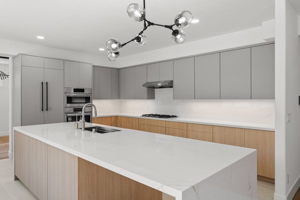 2024 Kitchen Remodel - The Beginning of a Dream Kitchen
When Amy L. reached out to us through Yelp, she was looking for a reputable contractor to transform her outdated kitchen into a modern, functional space. She had heard about our stellar reputation and was eager to see what we could do for her home. From the very first consultation, it was clear that Amy had a vision for her kitchen, and we were determined to bring it to life.
Understanding the Client's Vision
Amy's primary goal was to create a kitchen that not only looked stunning but also improved the overall functionality of the space. She wanted a layout that would make cooking and entertaining more enjoyable while incorporating high-quality materials and finishes. Our team took the time to understand her needs and preferences, ensuring that every detail was considered in the design process.
Designing the Perfect Kitchen
With Amy's vision in mind, we set out to create a design that would meet her expectations and enhance the overall aesthetic of her home. The first step was reimagining the floorplan. We opted for an island layout, which would provide ample counter space and create a natural gathering spot for family and friends.
Cabinets: We chose sleek flat-panel cabinets that offered a modern look while providing plenty of storage space.
Countertops: Quartzite countertops were selected for their durability and elegant appearance.
Flooring: Porcelain flooring was installed for its beauty and ease of maintenance.
Sinks: High-quality sinks were chosen to complement the overall design.
Lighting: Accent lighting and undercabinet lighting were added to enhance the ambiance and functionality of the space.
The Importance of Quality Materials
One unique aspect of this project was our focus on using premium materials that would stand the test of time. By selecting quartzite countertops and porcelain flooring, we ensured that Amy's kitchen would not only look beautiful but also withstand daily wear and tear. This attention to detail is what sets us apart from other contractors in San Diego.
The Remodeling Process
Once the design was finalized, our skilled team got to work on transforming Amy's kitchen. The project spanned over a couple of months, during which we meticulously executed each phase of the remodel.
Demolition and Preparation
The first step involved demolishing the existing kitchen structure. This included removing old cabinets, countertops, flooring, and appliances. Our team worked efficiently to ensure minimal disruption to Amy's daily routine.
Installing New Elements
With the old elements removed, we began installing the new components according to our carefully crafted design plan:
Cabinets: The flat-panel cabinets were installed with precision, providing ample storage space while maintaining a sleek appearance.
Countertops: The quartzite countertops were carefully placed, adding an element of luxury to the kitchen.
Flooring: Porcelain tiles were laid down meticulously, creating a durable and visually appealing foundation.
Sinks: High-quality sinks were installed seamlessly into the new countertops.
Lighting: Accent lighting and undercabinet lighting were strategically placed to enhance both aesthetics and functionality.
A Stunning Transformation
As the project neared completion, it became evident that Amy's dream kitchen was coming to life before our eyes. The combination of modern design elements with high-quality materials resulted in a space that was both beautiful and functional. 2024 Kitchen Remodel - The Beginning of a Dream Kitchen
When Amy L. reached out to us through Yelp, she was looking for a reputable contractor to transform her outdated kitchen into a modern, functional space. She had heard about our stellar reputation and was eager to see what we could do for her home. From the very first consultation, it was clear that Amy had a vision for her kitchen, and we were determined to bring it to life.
Understanding the Client's Vision
Amy's primary goal was to create a kitchen that not only looked stunning but also improved the overall functionality of the space. She wanted a layout that would make cooking and entertaining more enjoyable while incorporating high-quality materials and finishes. Our team took the time to understand her needs and preferences, ensuring that every detail was considered in the design process.
Designing the Perfect Kitchen
With Amy's vision in mind, we set out to create a design that would meet her expectations and enhance the overall aesthetic of her home. The first step was reimagining the floorplan. We opted for an island layout, which would provide ample counter space and create a natural gathering spot for family and friends.
Cabinets: We chose sleek flat-panel cabinets that offered a modern look while providing plenty of storage space.
Countertops: Quartzite countertops were selected for their durability and elegant appearance.
Flooring: Porcelain flooring was installed for its beauty and ease of maintenance.
Sinks: High-quality sinks were chosen to complement the overall design.
Lighting: Accent lighting and undercabinet lighting were added to enhance the ambiance and functionality of the space.
The Importance of Quality Materials
One unique aspect of this project was our focus on using premium materials that would stand the test of time. By selecting quartzite countertops and porcelain flooring, we ensured that Amy's kitchen would not only look beautiful but also withstand daily wear and tear. This attention to detail is what sets us apart from other contractors in San Diego.
The Remodeling Process
Once the design was finalized, our skilled team got to work on transforming Amy's kitchen. The project spanned over a couple of months, during which we meticulously executed each phase of the remodel.
Demolition and Preparation
The first step involved demolishing the existing kitchen structure. This included removing old cabinets, countertops, flooring, and appliances. Our team worked efficiently to ensure minimal disruption to Amy's daily routine.
Installing New Elements
With the old elements removed, we began installing the new components according to our carefully crafted design plan:
Cabinets: The flat-panel cabinets were installed with precision, providing ample storage space while maintaining a sleek appearance.
Countertops: The quartzite countertops were carefully placed, adding an element of luxury to the kitchen.
Flooring: Porcelain tiles were laid down meticulously, creating a durable and visually appealing foundation.
Sinks: High-quality sinks were installed seamlessly into the new countertops.
Lighting: Accent lighting and undercabinet lighting were strategically placed to enhance both aesthetics and functionality.
A Stunning Transformation
As the project neared completion, it became evident that Amy's dream kitchen was coming to life before our eyes. The combination of modern design elements with high-quality materials resulted in a space that was both beautiful and functional.