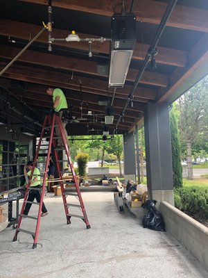 Commercial Heater Install - Installation of heaters on a restaurant patio.