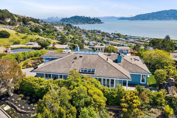 Just Sold - $2M Above Asking Price - Sitting on top of the world. Imagine a spot in Tiburon on its own private flat setting showcasing panoramic San Francisco views, and, wait for it, BOTH towers of the Golden Gate bridge. A truly magnificent one-level retreat awaits on your own private knoll shielded from neighbors and distractions. It's just you and the view! Awaken to the ocean's reflection glistening from the sunrise and retire to the patio overlooking a glorious sunset over the Bay. Meticulously updated, easy to access from SF/Hwy 101 and boasting almost 3300 square feet on a 14,400 sq. ft. mostly flat lot. Built in 2003 and completely turn-key, this idyllic property is perfect for entertaining, convenience, privacy, and elegance alike. A glorious entry with vaulted ceilings and a row of skylights that light up the interior rooms create a dramatic setting with all the rooms emanating from the center hallway. Surrounded on all sides by easily accessible mature gardens. A place to settle and a place to dream BIG!