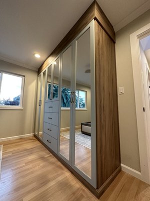 Bedroom Wardrobe - This project added beautiful style with functional storage to a bedroom. Mirrored doors added a nice feel to the room. Bedroom Wardrobe - This project added beautiful style with functional storage to a bedroom. Mirrored doors added a nice feel to the room.