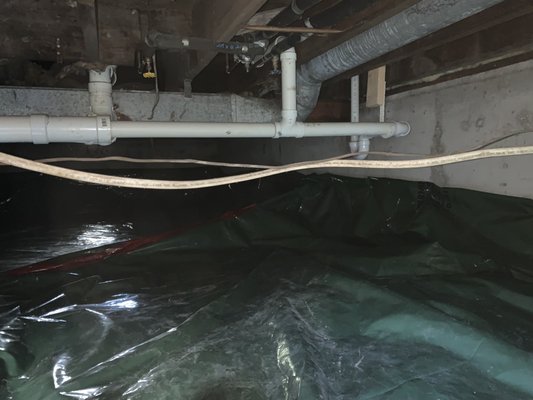 Crawlspace Encapsulation - We are looking to educate our customer, not just make a sale. We make sure that crawlspace encapsulation is the right solution for you because every crawlspace is different. A sheet of plastic lying on the ground is not enough to keep ground moisture from entering the crawlspace, as we find in many crawlspaces. Standard plastics are not a rated vapor barrier and are seldom installed properly. Often, the plastic was laid on the ground by a previous homeowner and not a licensed professional. High humidity levels from water leaks and ground water are only increased if dirt or gravel floors are present. We will take the time to inspect the crawlspace, and use a waterproofing tape to adhere the thicker waterproofing plastic up the walls of the crawlspace to create a barrier for vapors and water entering the crawlspace to dissipate into the earth quickly and to make your crawlspace a clean space to use for additional storage. Crawlspace Encapsulation - We are looking to educate our customer, not just make a sale. We make sure that crawlspace encapsulation is the right solution for you because every crawlspace is different. A sheet of plastic lying on the ground is not enough to keep ground moisture from entering the crawlspace, as we find in many crawlspaces. Standard plastics are not a rated vapor barrier and are seldom installed properly. Often, the plastic was laid on the ground by a previous homeowner and not a licensed professional. High humidity levels from water leaks and ground water are only increased if dirt or gravel floors are present. We will take the time to inspect the crawlspace, and use a waterproofing tape to adhere the thicker waterproofing plastic up the walls of the crawlspace to create a barrier for vapors and water entering the crawlspace to dissipate into the earth quickly and to make your crawlspace a clean space to use for additional storage.
