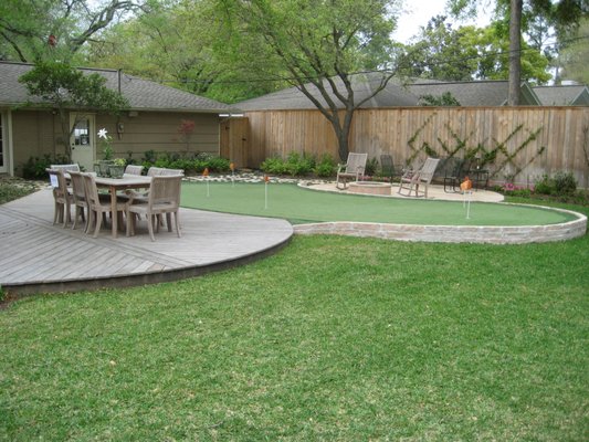 Patio, Deck, and Putting Green - Custom designed and built Angelim wood deck with putting green, firepit, flagstone patio, and flagstone stepping stones. Patio, Deck, and Putting Green - Custom designed and built Angelim wood deck with putting green, firepit, flagstone patio, and flagstone stepping stones.
