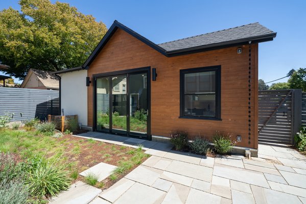 ADU Oakland - This was almost 700 sqft. ADU with vaulted ceilings, a kitchen, a bathroom, a bedroom, and a living space.