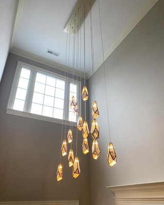 Foyer chandelier - We installed this beautiful multi pendant chandelier to dramatically improve the foyer in this Raleigh home. Foyer chandelier - We installed this beautiful multi pendant chandelier to dramatically improve the foyer in this Raleigh home.