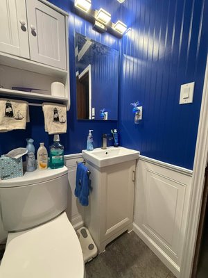 Tub-to-Walk-In Shower & Complete Bathroom Remodel - This bathroom received a complete remodel focused on safety, accessibility, comfort, and a fresh new look.

We converted the existing tub/shower combination into a walk-in shower with grab bars, making it safer and easier to use. We also installed a chair-height toilet and replaced the sink and fixtures.

After removing the old flooring, we discovered areas of the subfloor that needed repair. Those repairs were completed before installing the new flooring, ensuring the finished bathroom was built on a solid foundation.

The remodel also included new drywall and paint throughout, along with updated light fixtures and a new exhaust fan.

From plumbing and repairs to the finishing touches, this project gave the homeowner a bathroom that is safer, more functional, and completely refreshed.