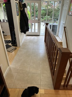 Wood to tile - Old wood floor was getting a bit worn out so we replaced it with tile. Wood to tile - Old wood floor was getting a bit worn out so we replaced it with tile.